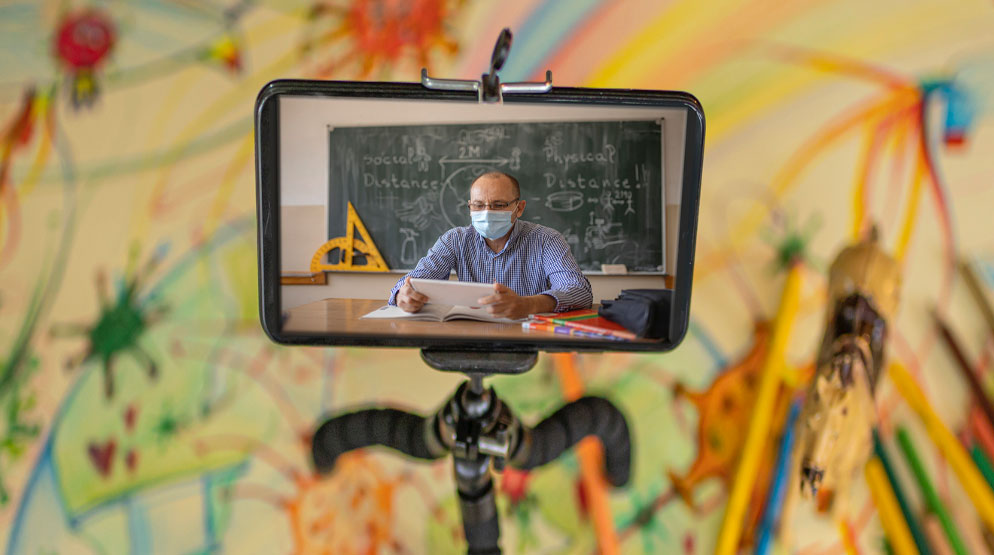 teacher on screen teaching