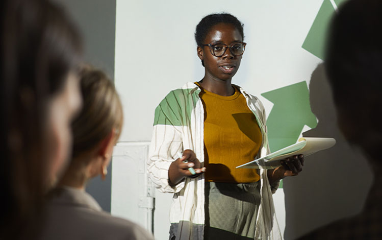 woman speaking to audience