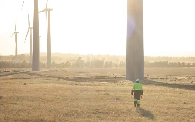 Man walking in win field