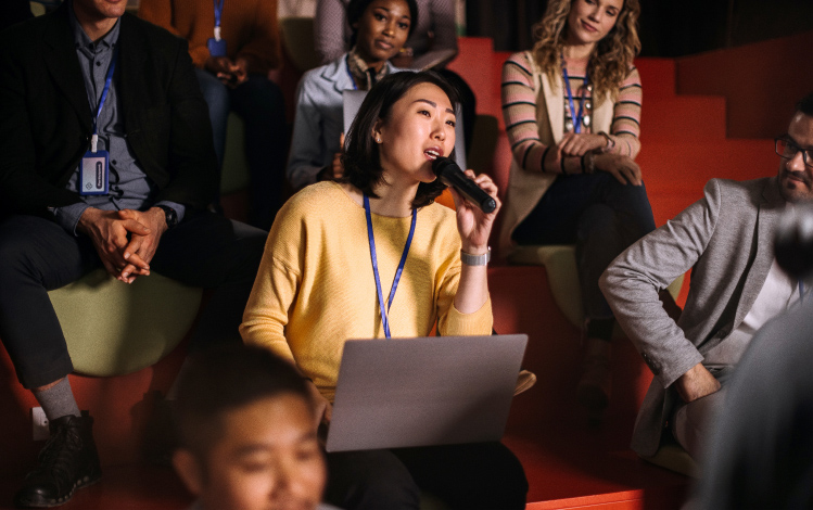 woman speaking with microphone