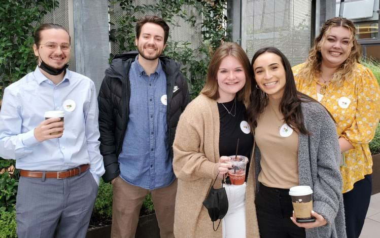 Intern group smiling