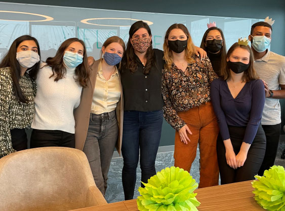 Group of WE interns wearing masks